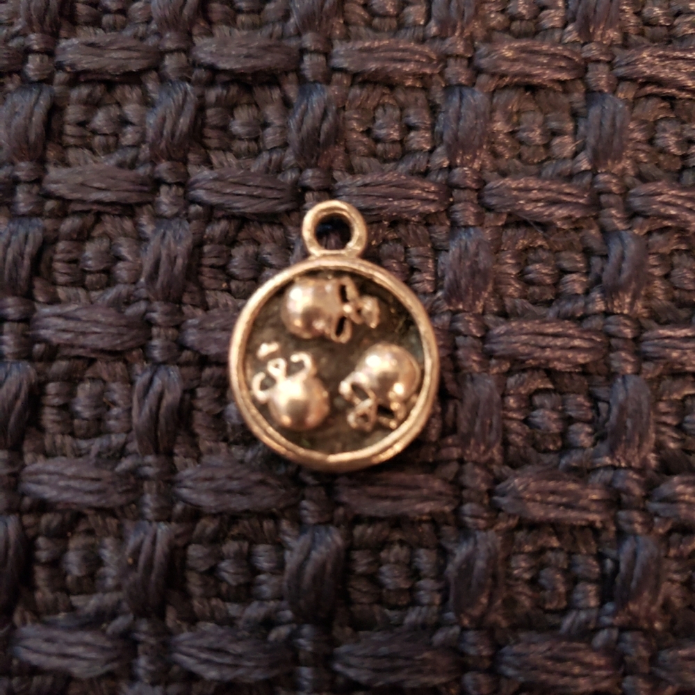 Sterling silver skull charm